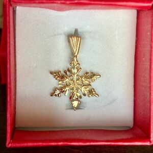 Solid 14k yellow gold snowflake pendant